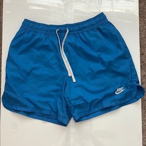 Nike Blue Athletic Shorts with Drawstring and Swoosh